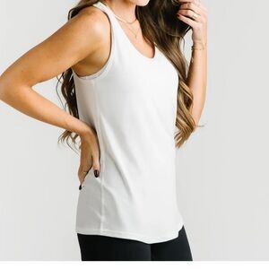 New Zyia white twist tank, size medium  from smoke free home